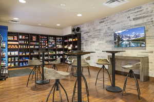 Bar with wood-type flooring