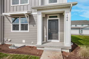 Property entrance with a garage