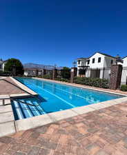 View of pool featuring a mountain view