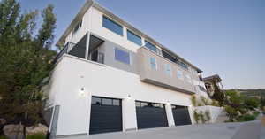 View of building exterior with a garage