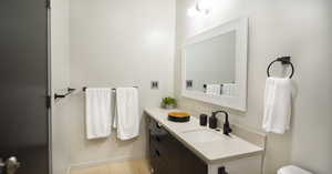 Bathroom with wood-type flooring and vanity