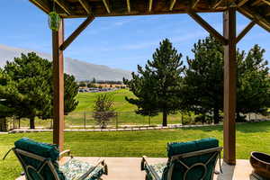 View of patio / terrace featuring a mountain view