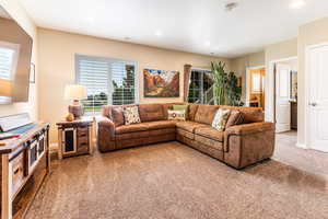 Living room with carpet floors