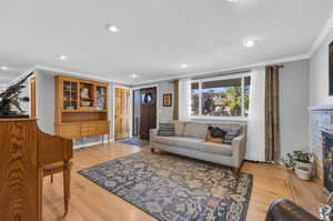 Living room, wood doors, gas fireplace