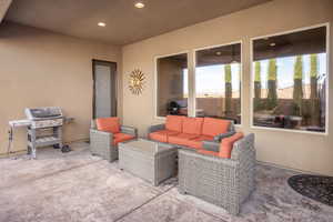 View of patio / terrace featuring an outdoor living space and grilling area