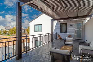 View of patio / terrace with outdoor lounge area and a pergola