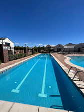 View of swimming pool with a patio