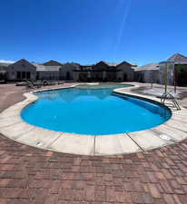 View of pool with a patio area