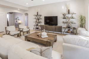 Living room with light hardwood / wood-style flooring