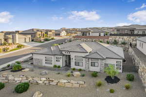 View of front of home featuring a garage