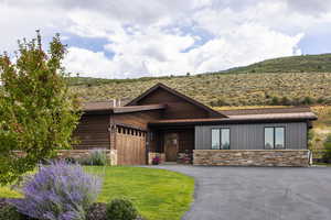 View of front of home featuring a garage