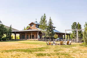 View of front of house featuring a front lawn