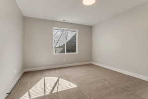 Basement Bedroom with Faux Rock window wells