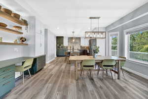 Dining space featuring light hardwood / wood-style flooring