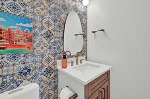 Bathroom with vanity and toilet