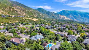 Birds eye view of property featuring a mountain view