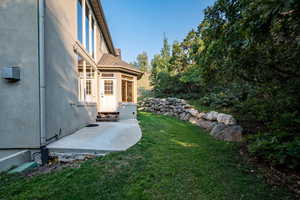 View of yard with a patio