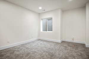 Unfurnished room featuring carpet floors