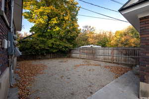 Rear yard is spacious and hold lots of potential!