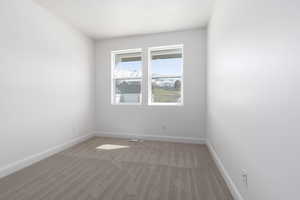 View of carpeted spare room