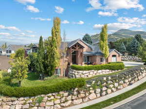 View of front of house with a mountain view