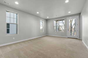 View of carpeted spare room