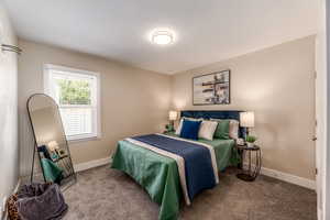 Bedroom featuring carpet