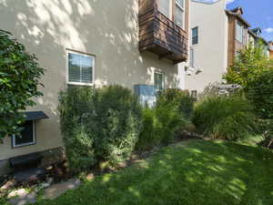 View of  side yard gate between front and side yard for dogs