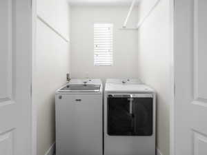 Laundry room featuring washer and dryer