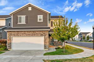 View of front of property featuring a garage