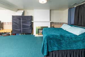 Bedroom featuring carpet flooring