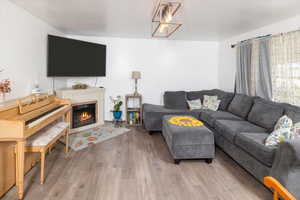 Living room with light wood flooring