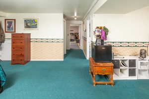 Living area featuring carpet floors