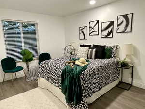 Bedroom featuring hardwood / wood-style floors