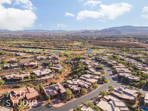 Birds eye view of property with a mountain view