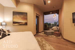 Bedroom with wood-type flooring and ceiling fan