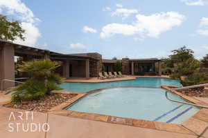 View of swimming pool featuring a patio