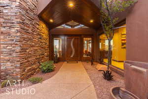 Property entrance featuring french doors