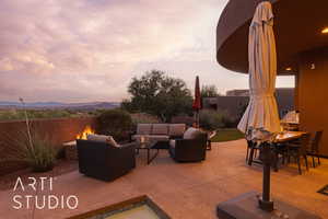 Patio terrace at dusk with an outdoor hangout area