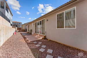 View of backyard area featuring a patio