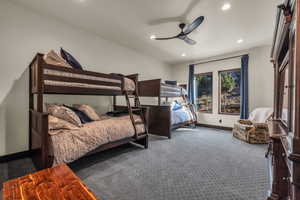 Bedroom with carpet flooring and ceiling fan