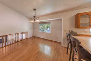 Dining area featuring light hardwood / wood-style flooring