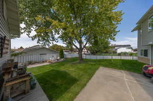 View of yard with a patio