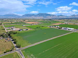 Drone / aerial view featuring a mountain view and a rural view