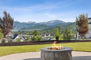 View of mountain backdrop with nearby suburban area