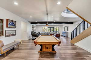 Rec room featuring pool table and dark hardwood / wood-style floors