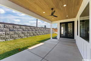 View of patio / terrace featuring french doors and ceiling fan