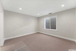 Spare room with light carpet