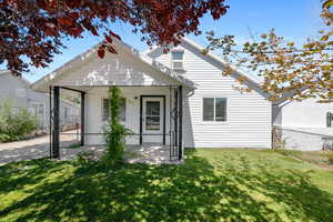 Bungalow-style home featuring a front yard