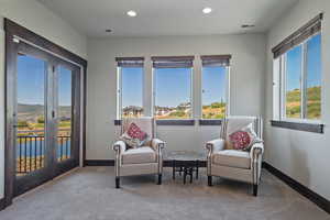 Living area featuring carpet floors